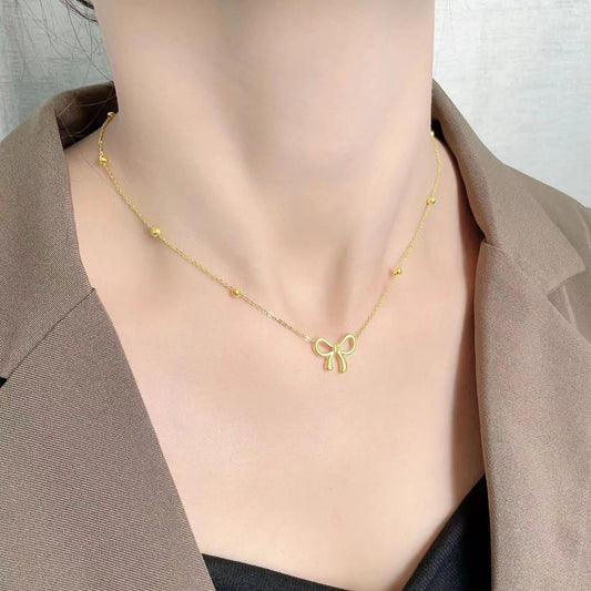 Golden Bow Pendant Necklace – Beaded Chain