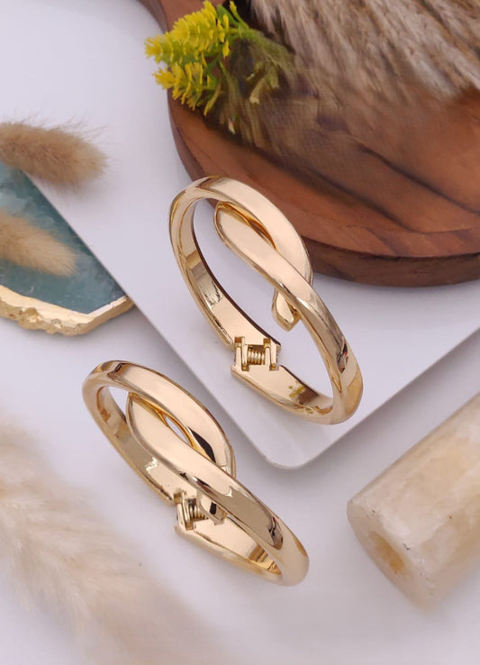 Sculptural Gold Cuff Bracelets