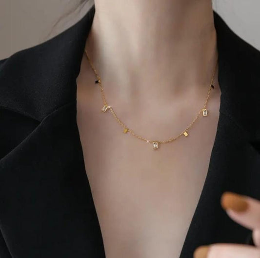 Golden Charm Cascade Necklace