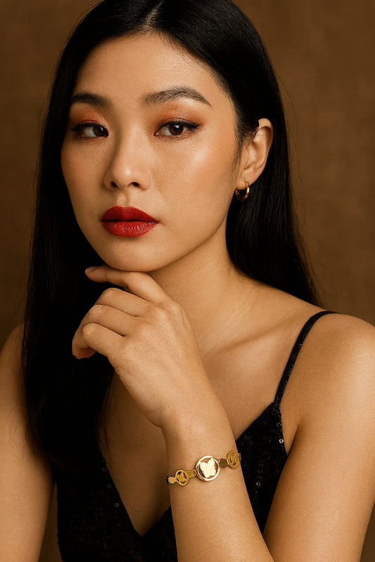 Butterfly Emblem Gold Bracelet