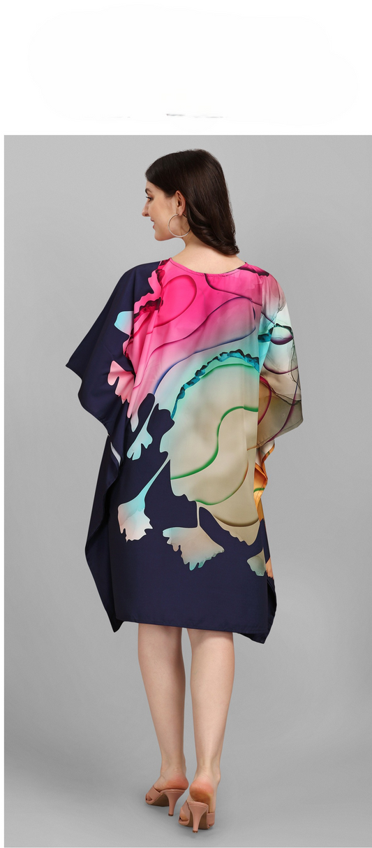 Woman wearing a colorful kimono-style garment on a gray background