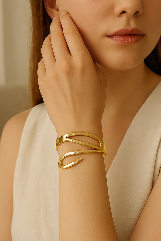 Sculpted Swirl Cuff – Polished Gold