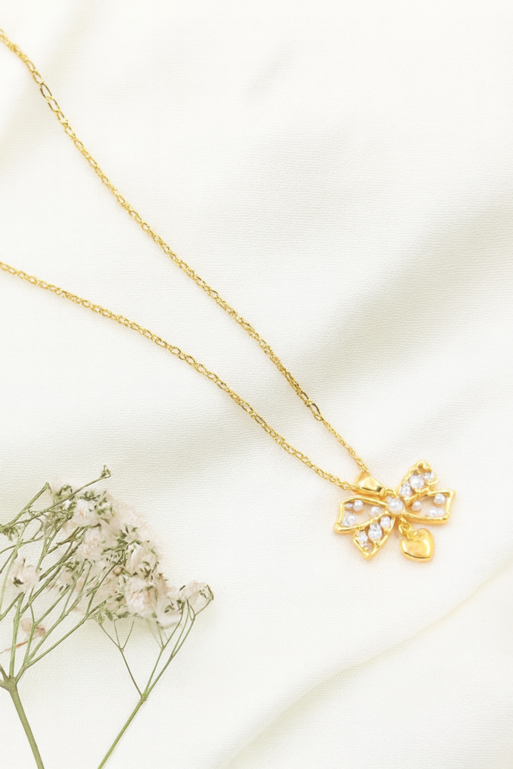 Pearl Bow Pendant Necklace