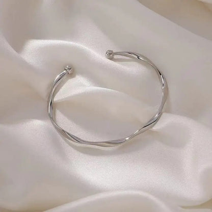 Twisted Silver Elegance Bangle