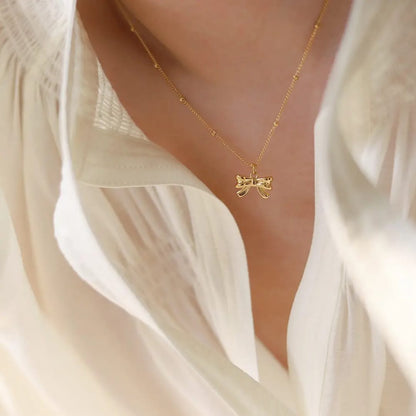 Gold Bow Pendant Necklace