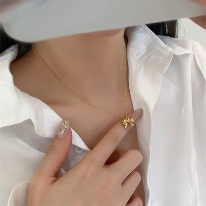 Gold Bow Pendant Necklace