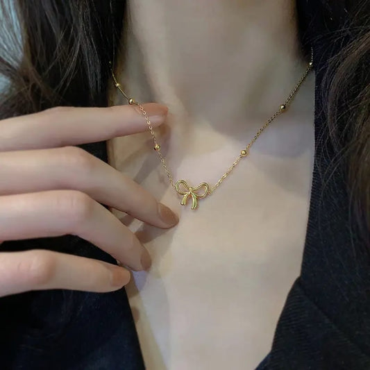 Golden Bow Pendant Necklace – Beaded Chain