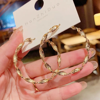 Twisted Radiance Gold Hoop Earrings