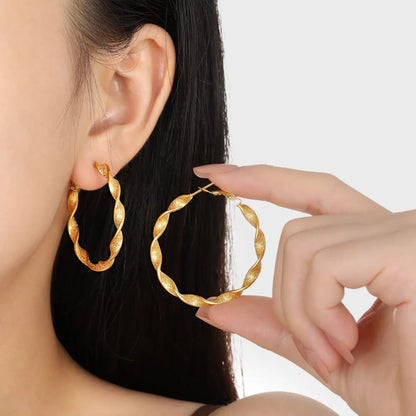 Twisted Radiance Gold Hoop Earrings