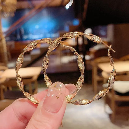 Twisted Radiance Gold Hoop Earrings