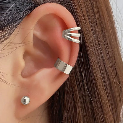 Sculptural Silver Ear Ensemble