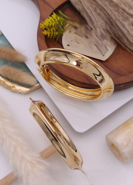 Sculptural Gold Cuff Bracelets