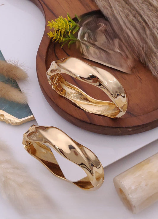 Sculptural Gold Cuff Bracelets
