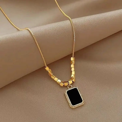 Gold Flat Chain Necklace with Black Pendant