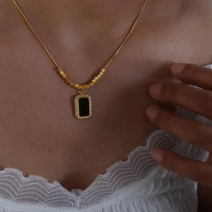 Gold Flat Chain Necklace with Black Pendant