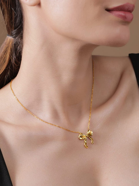 Golden Bow Whisper Necklace