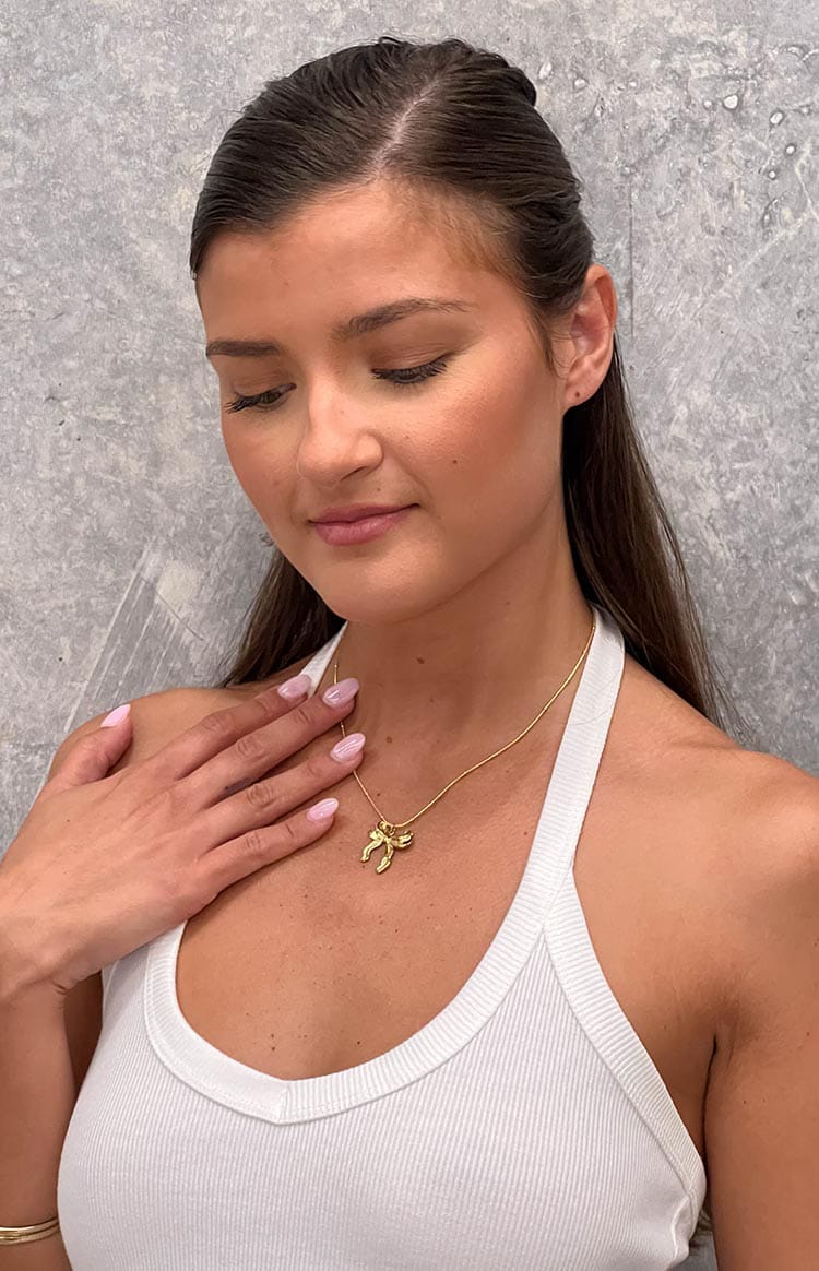 Golden Bow Whisper Necklace