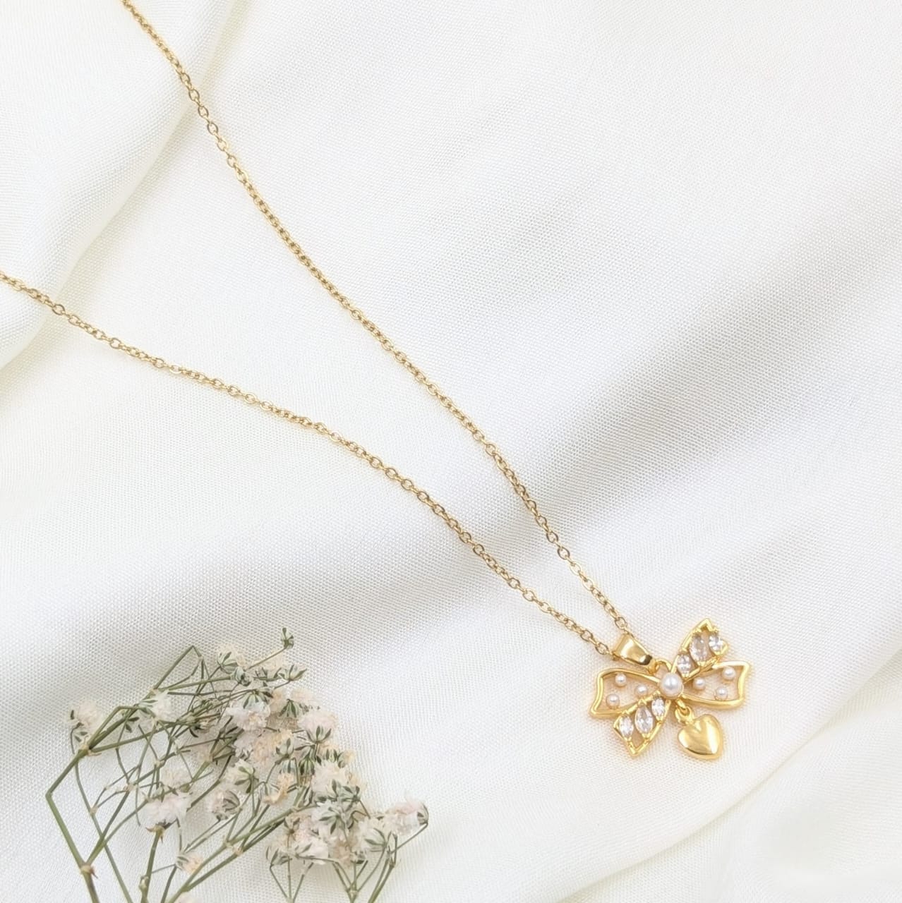 Pearl Bow Pendant Necklace