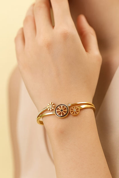 Gold Charm Bracelet with Starburst & Crystal Accents