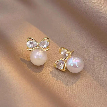 Gold Bow Earrings with Pearl Drops