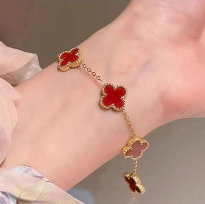 Gold Bracelet with Red Clover Charms