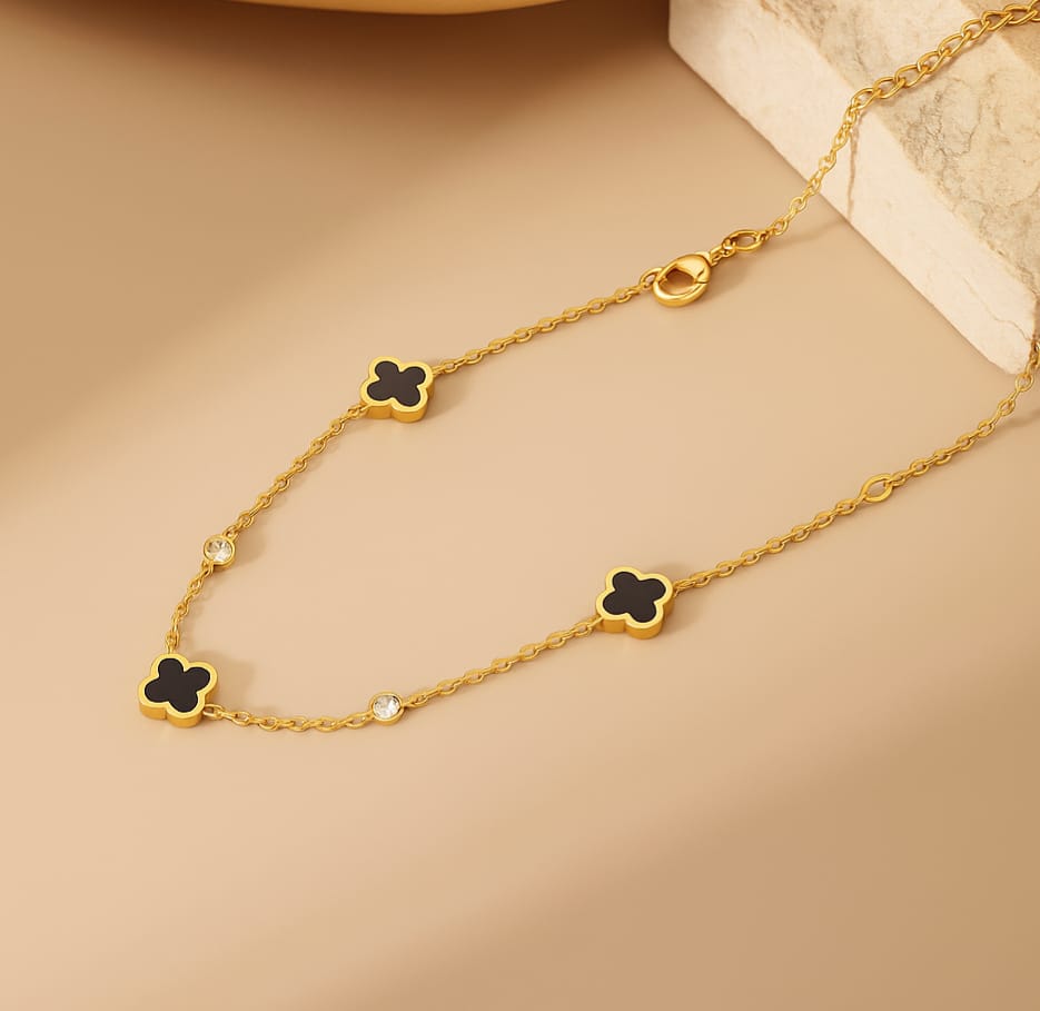 Gold Chain with Black Clover & Crystal Charms