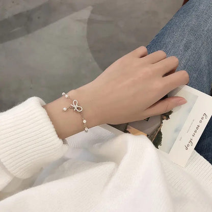 Pearl Bow Charm Bracelet