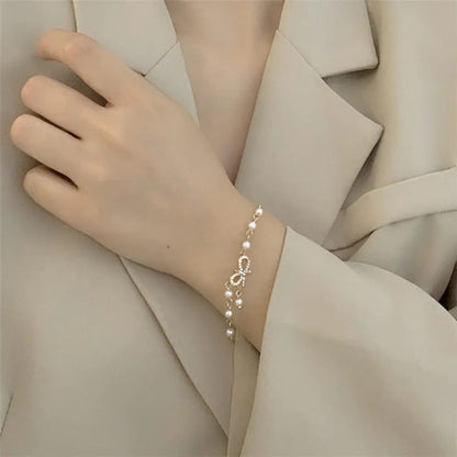 Pearl Bow Charm Bracelet