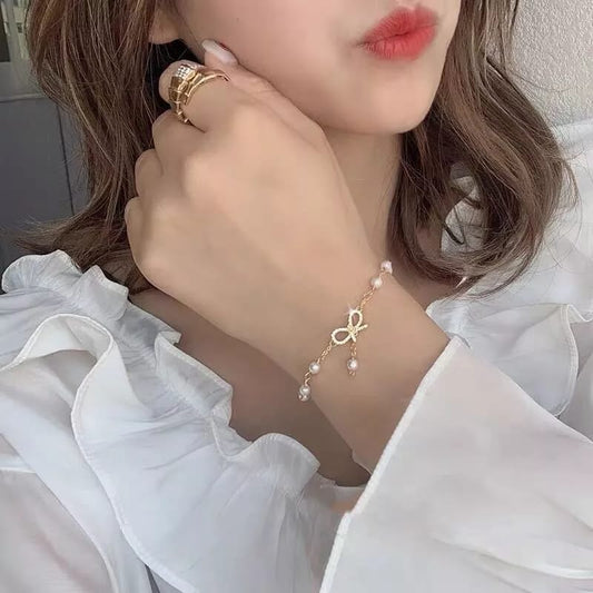 Pearl Bow Charm Bracelet