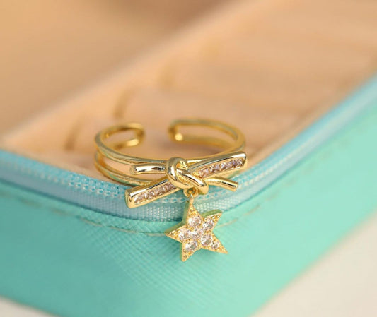 Gold Bow Ring with Star Accent