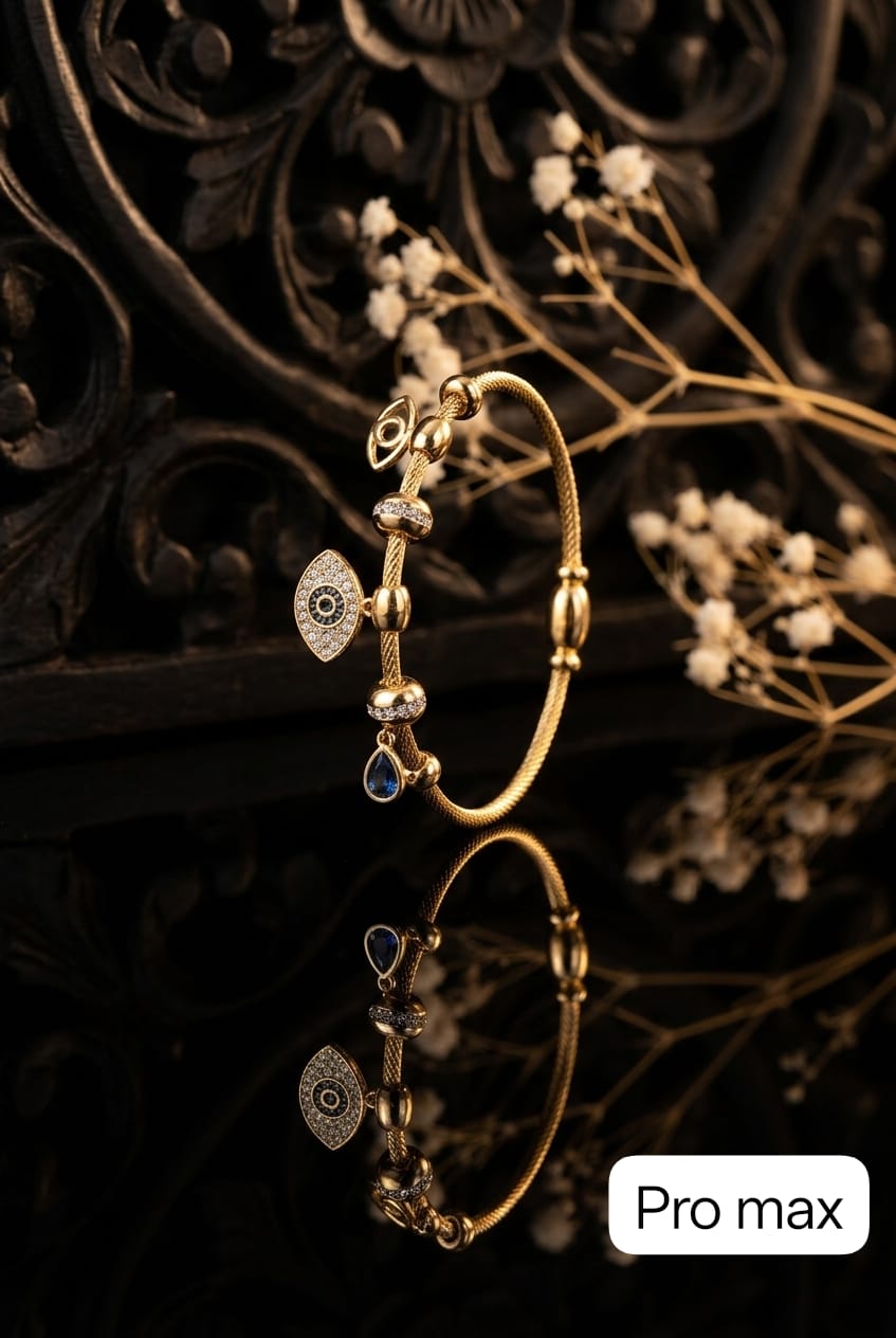 Golden Charm Bracelet with Blue Gemstone