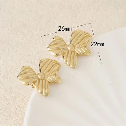 Sculpted Bow Statement Earrings
