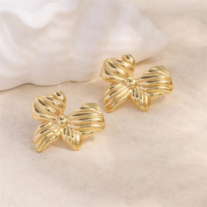 Sculpted Bow Statement Earrings